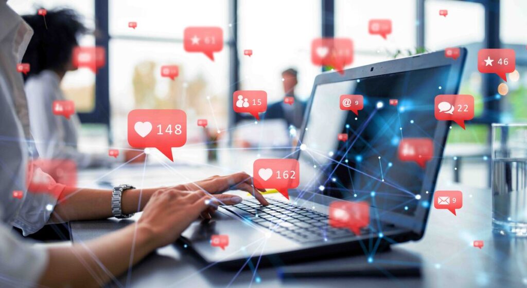 businesswoman-works-with-social-networks-laptop